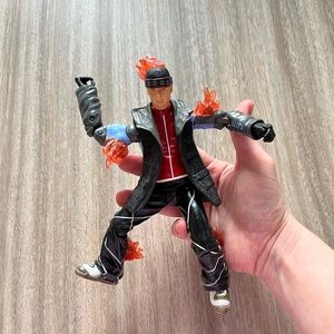 Action Figure with Black Jacket and Red Flames
